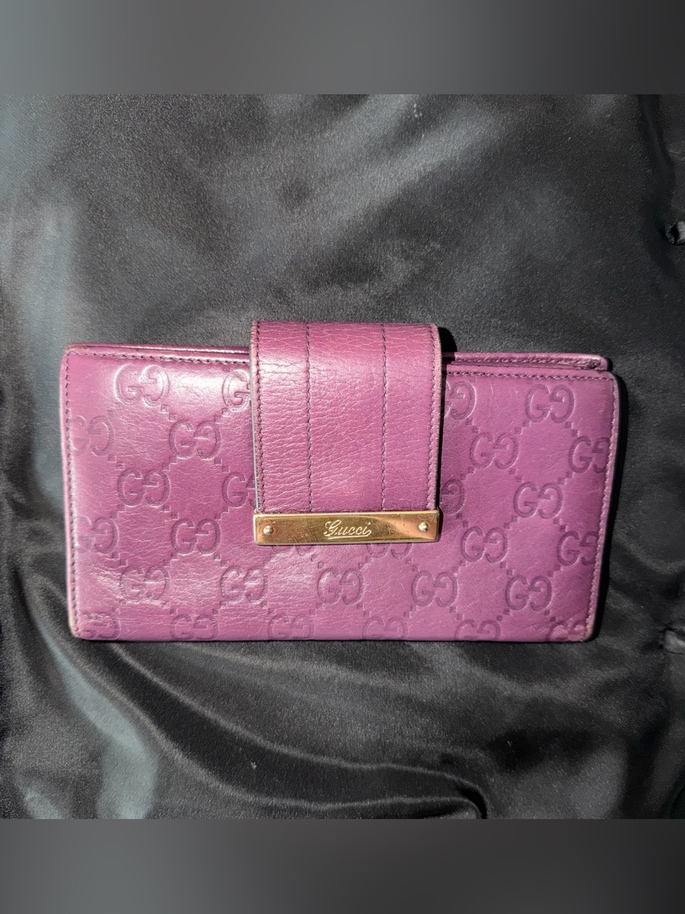GUCCI Embossed GG Monogram Leather Wallet in Purple